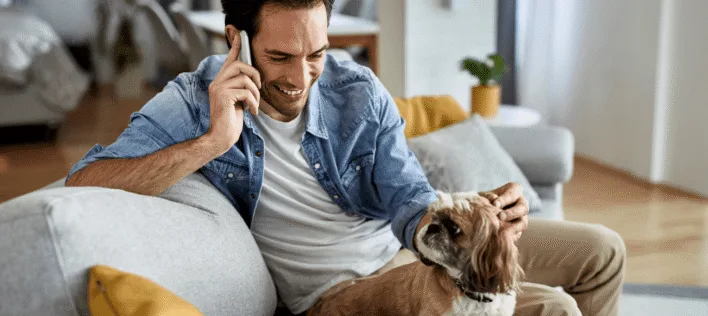 man calling with dog