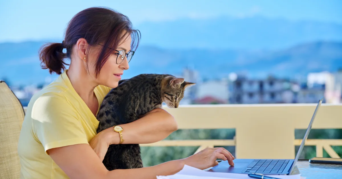 Australian lady working outdoors with her cat